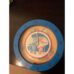 Wall clock in the night garden