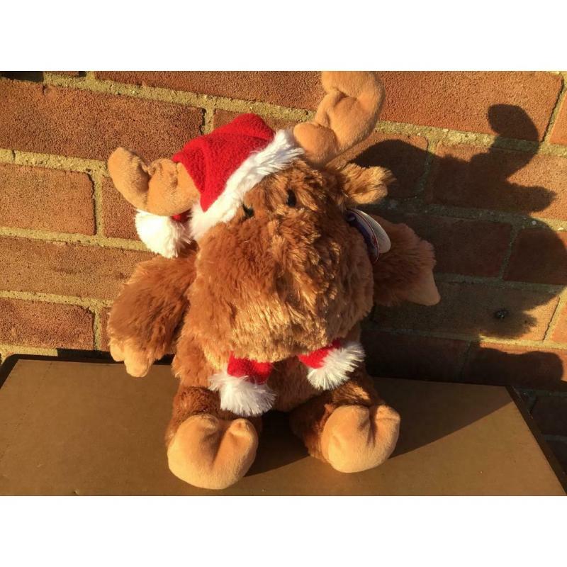 CHRISTMAS REINDEER ALL DRESSED UP FOR CHRISTMAS.