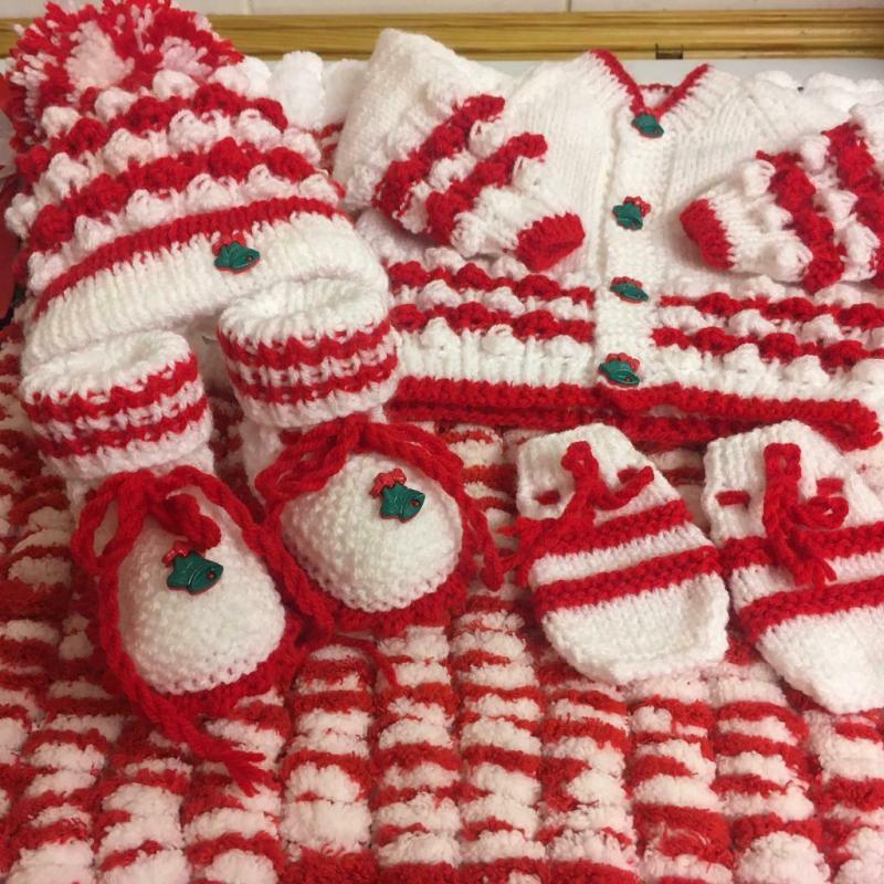 Hand knitted baby?s bundle first size very festive