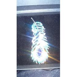 peacock feather brooch