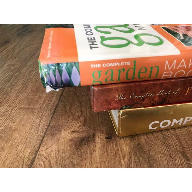 3 large hard back books