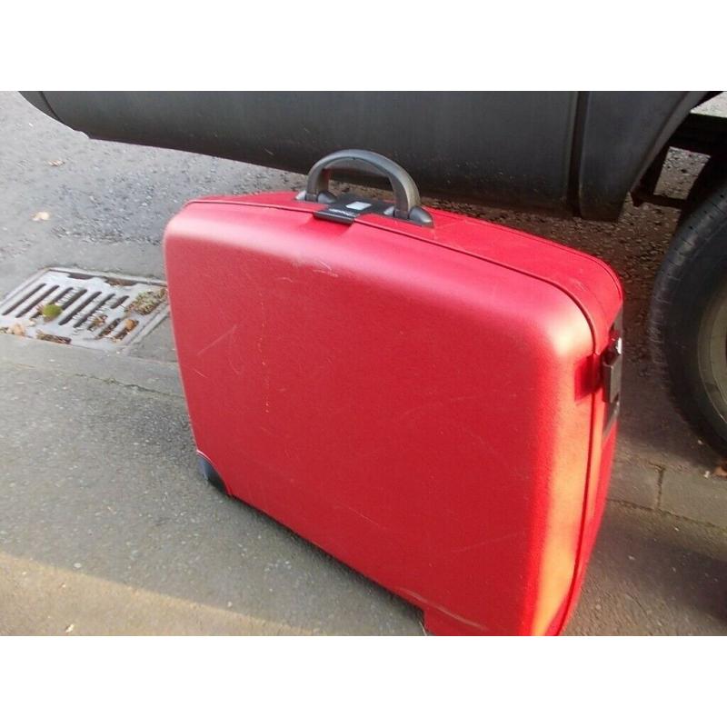 Delsey Hard shell Suitcase in Red With Combination lock