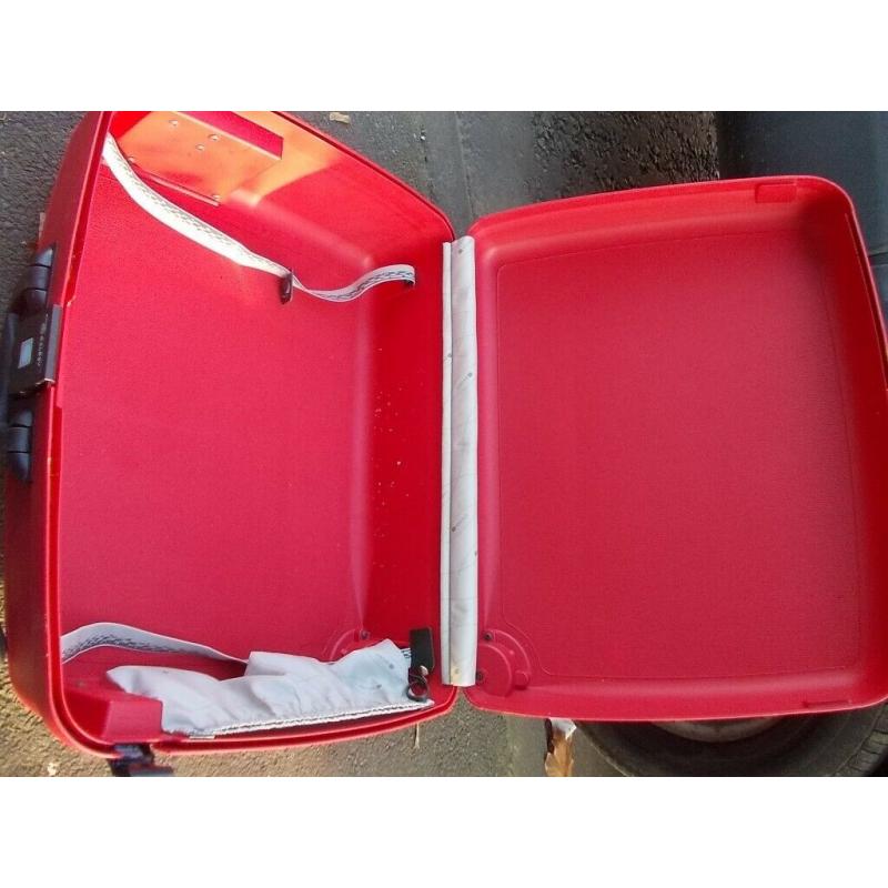 Delsey Hard shell Suitcase in Red With Combination lock