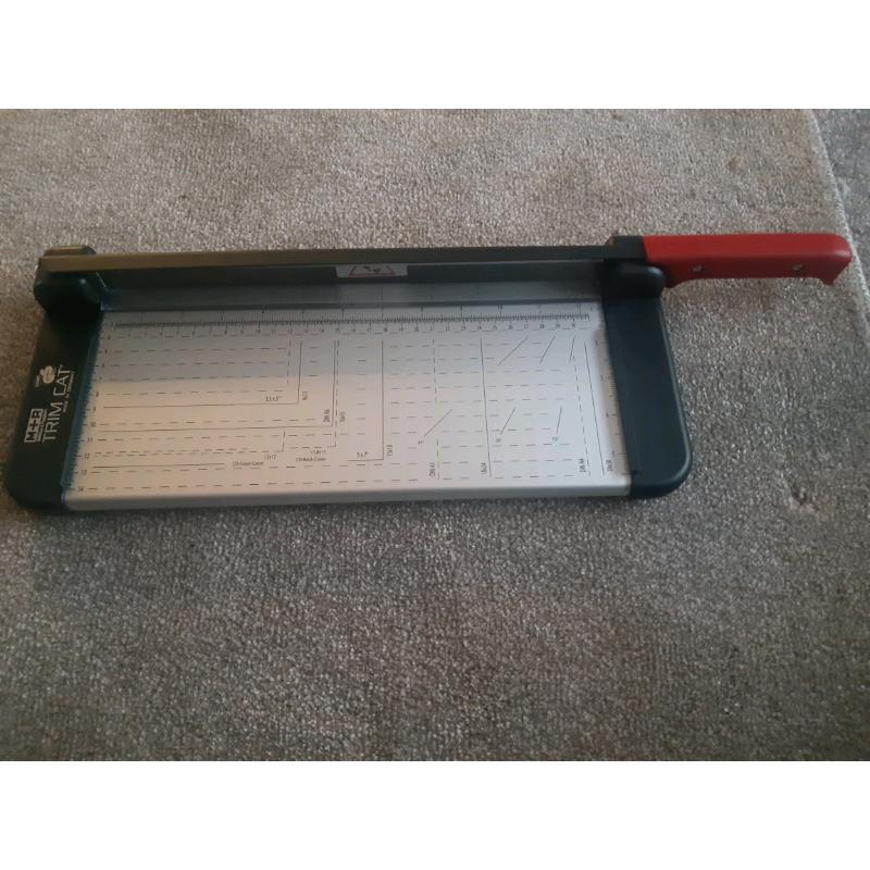 Trim Cat blade paper trimmer.